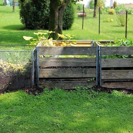 An image of a compost heap in a garden